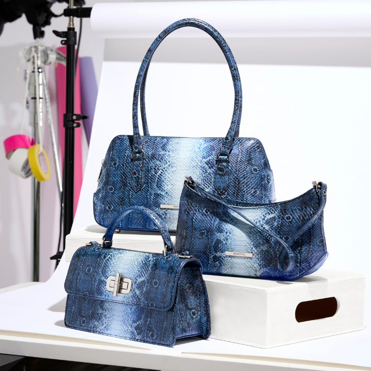 Brahmin Vintage Indigo handbag collection featuring blue patterned satchel, shoulder bag and top handle bag with structured silhouettes and polished hardware.
